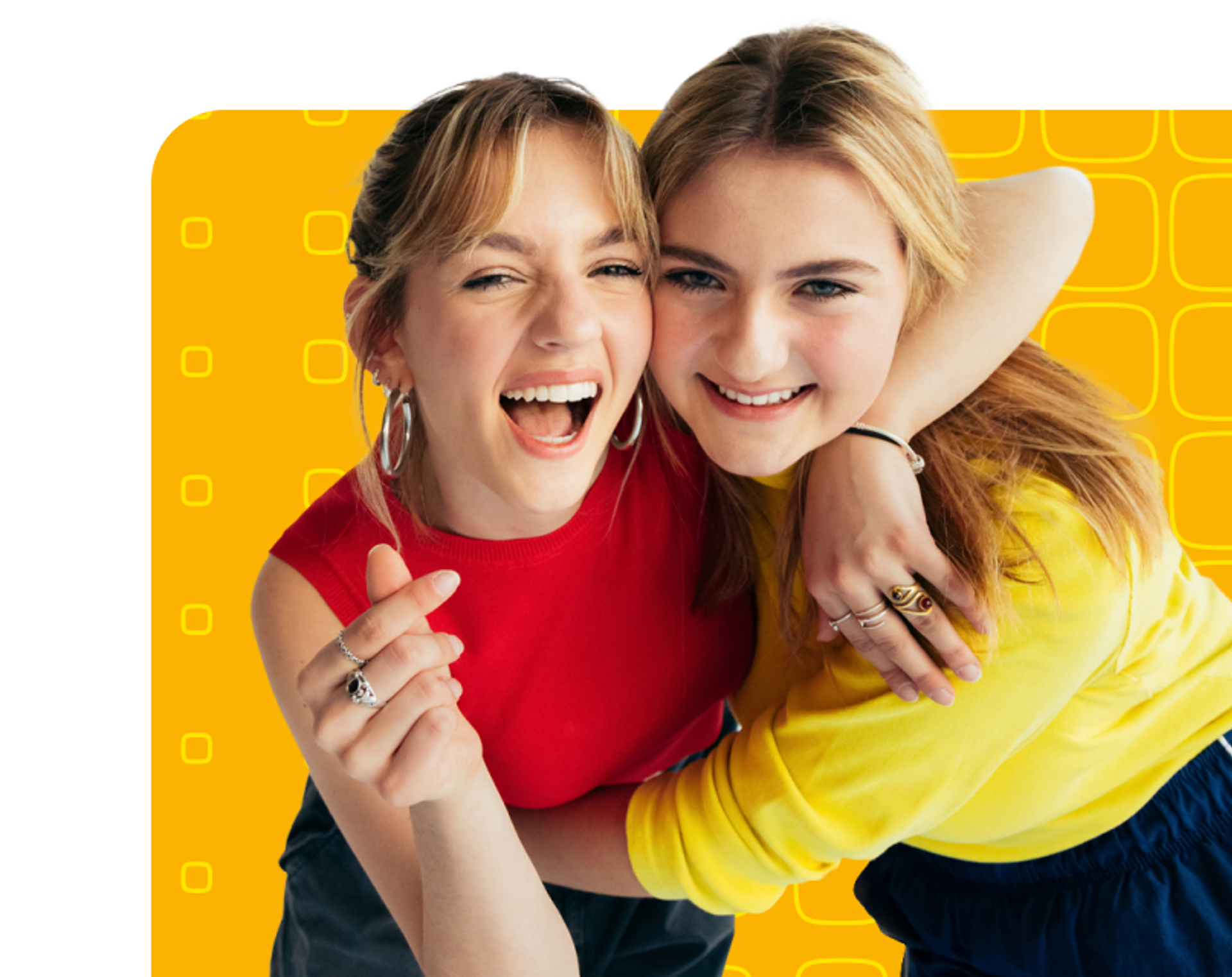 Two girl hugging and smiling